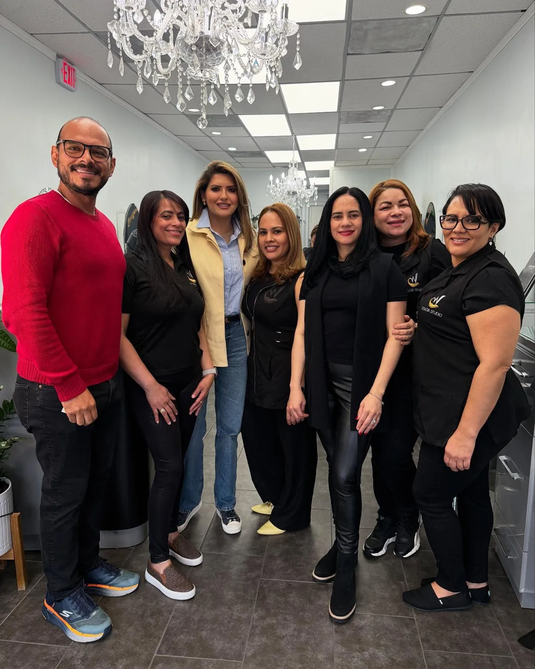 The W Color Studio team standing together inside the salon